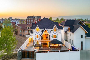 StayVista at Gauhar with Projector Set-up, Steam Room & Indoor Jacuzzi